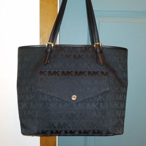 NWOT only used once Michael kors tote purse black cloth with leather trim